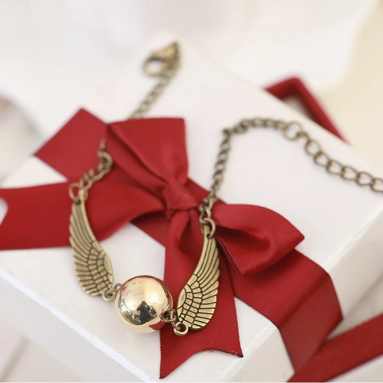 Brățară Harry Potter Brățară tematică din seria Harry Potter – model cu Snitch